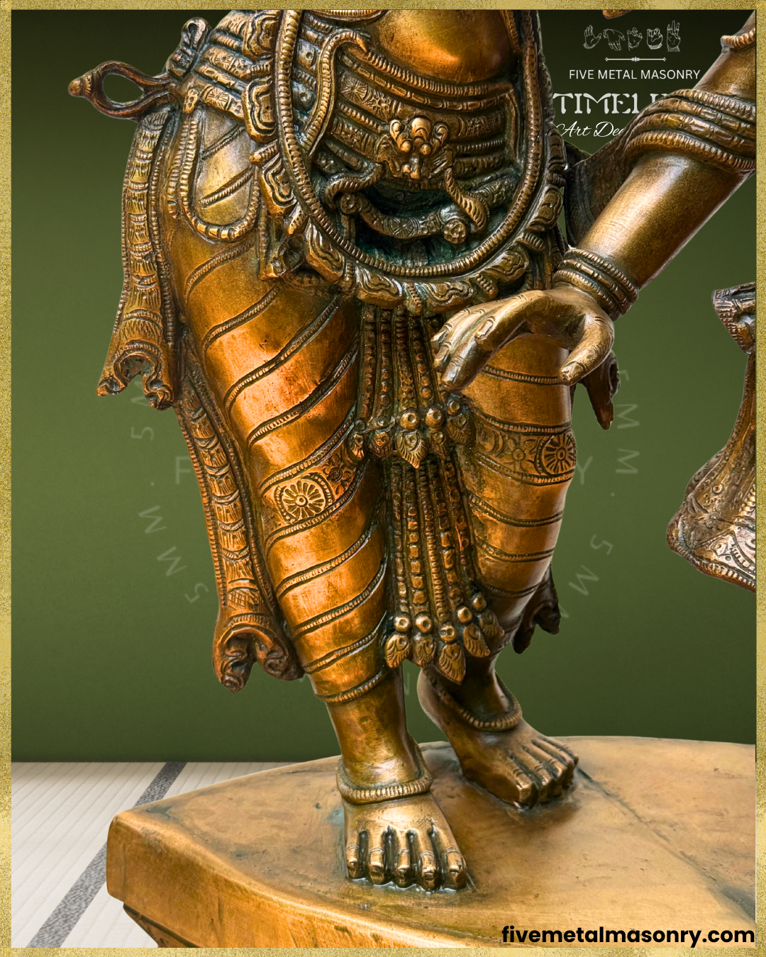 Close-up view of handcrafted Panchaloha bronze Krishna as Venugopala from the Timeless Collection, highlighting the finely detailed lower garment, layered waist ornaments and pendant details, flexed-leg stance, anklets and sculpted feet.