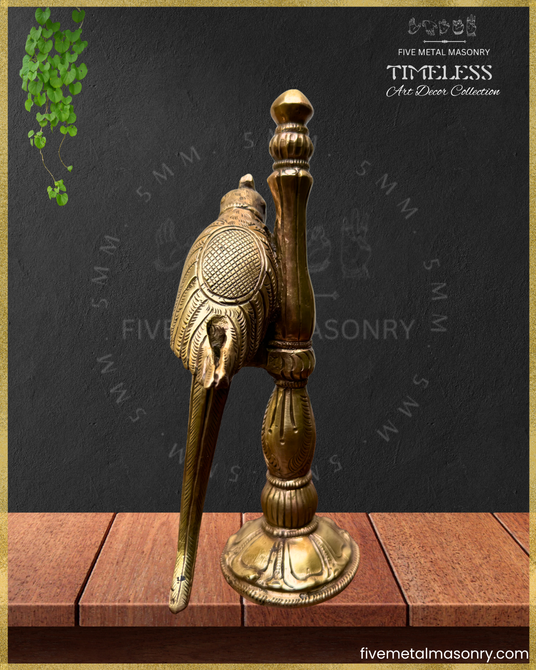 Bronze parrot perched on a pillar sculpture with a dark background