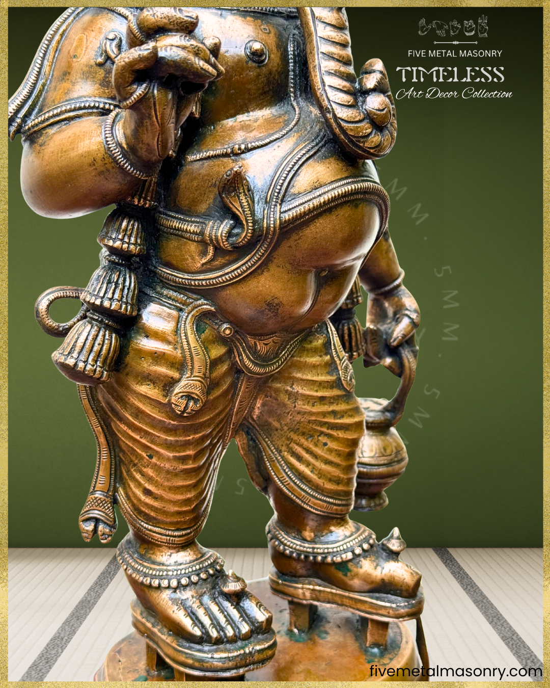 Close-up of antique finish Panchaloha bronze Ganesha highlighting pot belly, naga-yajnopavita, pleated lower garment, kamandalu, anklets and detailed South Indian sculptural craftsmanship from the Timeless collection.