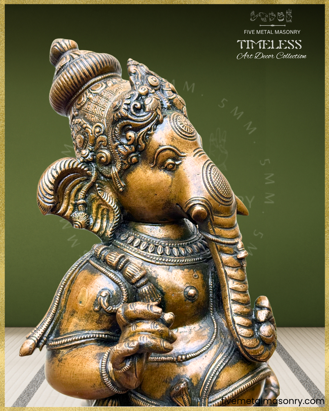 Close-up side view of antique finish Panchaloha bronze Ganesha featuring expressive elephant face, ornate karanda makuta with yali motifs, detailed ear ornaments, coiled trunk, layered necklaces and refined South Indian sculptural craftsmanship from the Timeless collection.
