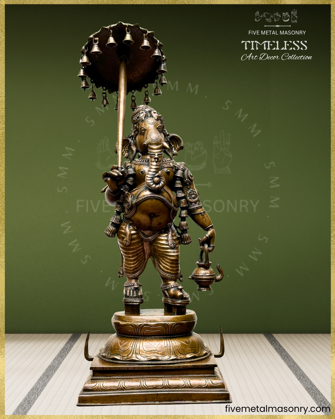 Front projected view of Panchaloha bronze Ganesha with ceremonial umbrella and kamandalu, standing in graceful yanaka posture, adorned with layered ornaments, karanda makuta and detailed South Indian sculptural craftsmanship from the Timeless collection.