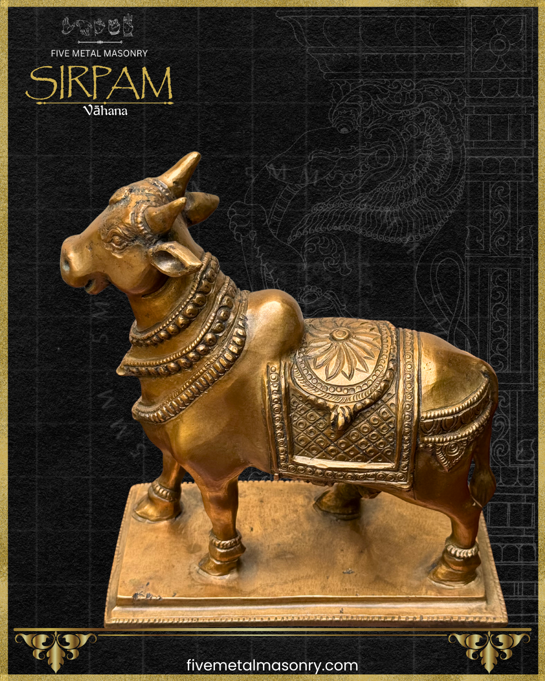 Top angle view of a handcrafted panchaloha bronze Vrsabha (Nandi) statue from the Sirpam Collection, highlighting the expressive head, sculpted anatomy, layered neck ornaments, ornate ceremonial saddle cloth with floral and geometric motifs, and rectangular pedestal in the South Indian sculptural tradition.
