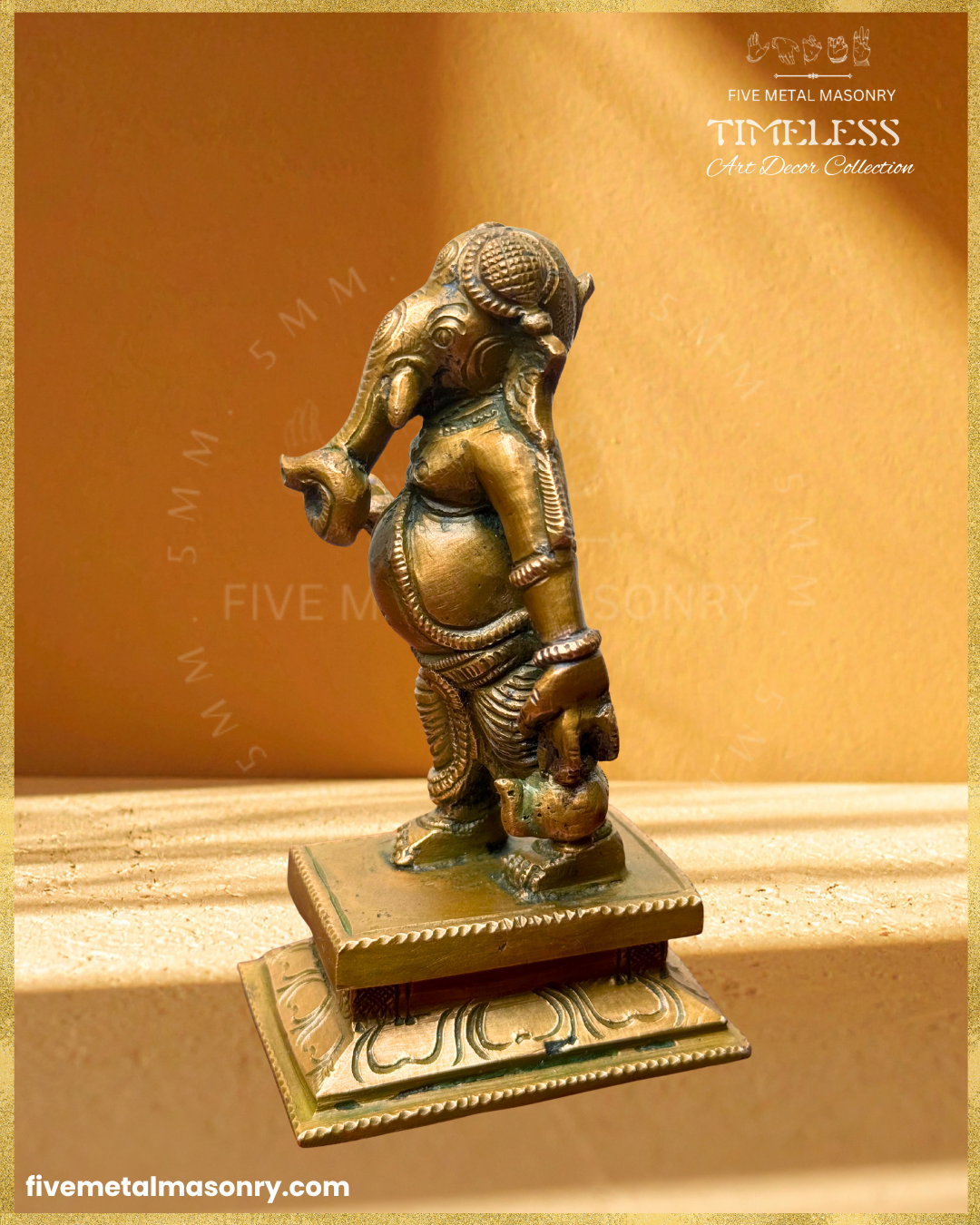 Side view of handcrafted Panchaloha bronze Umbrella Ganesha (Mapillai Ganesha) in a walking posture, highlighting the curled trunk, ornaments, pleated garment and water pot, from the Timeless collection, rooted in silpa-sastra tradition.