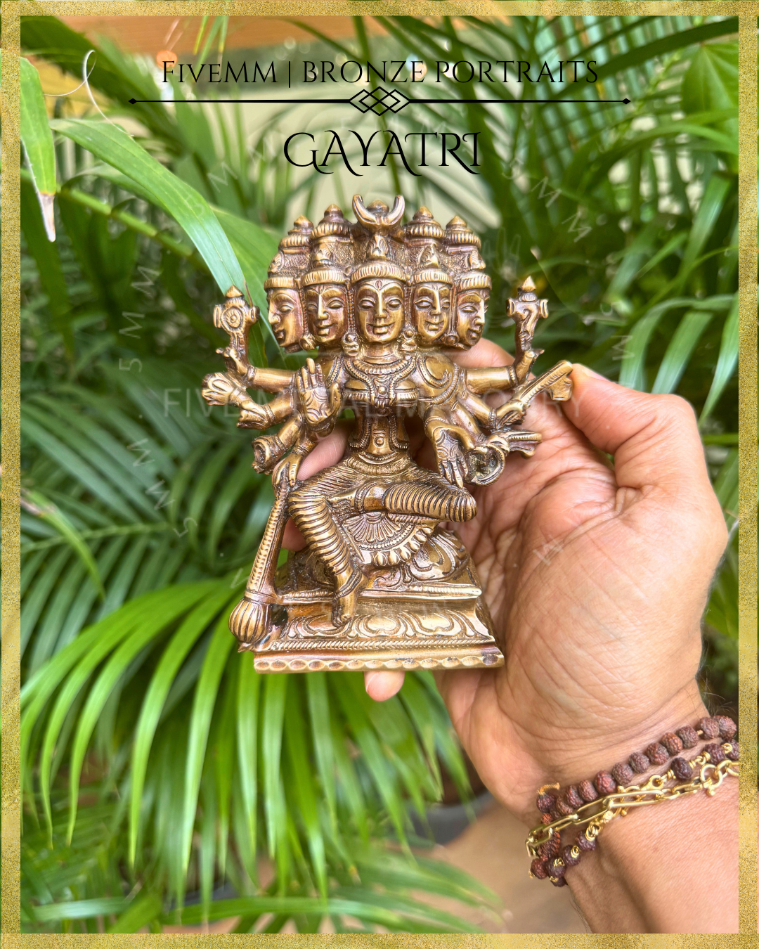 Hand-held view of Handcrafted Panchaloha bronze of five-headed, ten-armed Gayatri Devi seated in lalitasana on a padma pitha, holding multiple ayudhas and attributes, following silpa-sastra and traditional iconographic tradition.