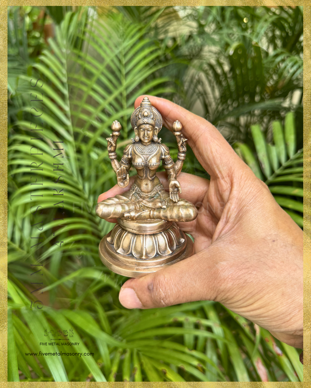Handheld panchaloha bronze seated Lakshmi icon from the Masterpieces collection in padmasana posture, holding lotus buds in the upper hands with lower hands in abhaya and varada hastas, featuring kirita makuta, siraschakra, layered ornamentation and lotus pedestal in South Indian bronze style.