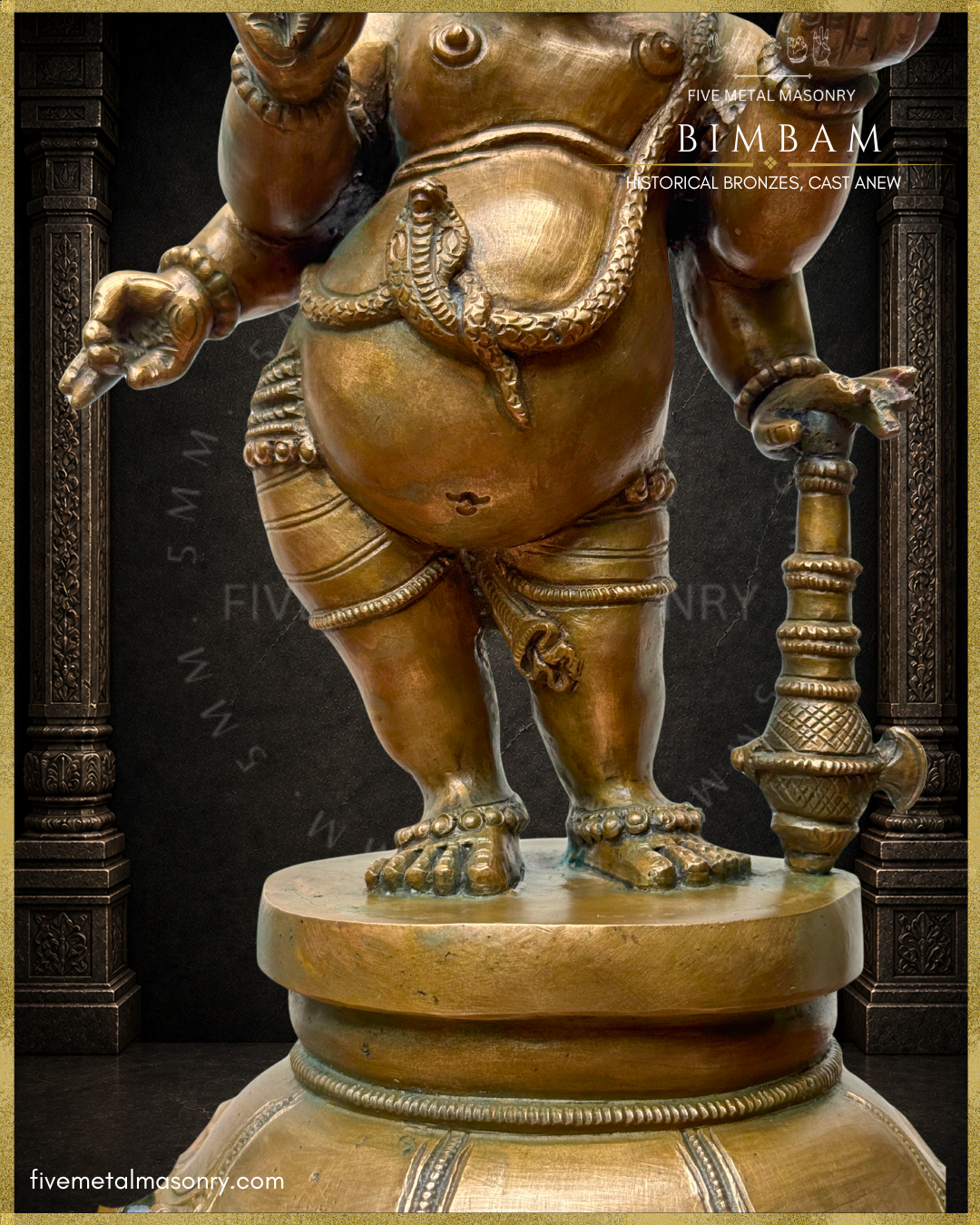 Three-quarter close-up view of the BIMBAM Thiruvanaikaval Ganesha in handcrafted Panchaloha, highlighting the serpent with raised hood forming the upavita across the belly, bell ornaments at the thighs and ankles, and the lower left hand resting on a long-handled ankusa.