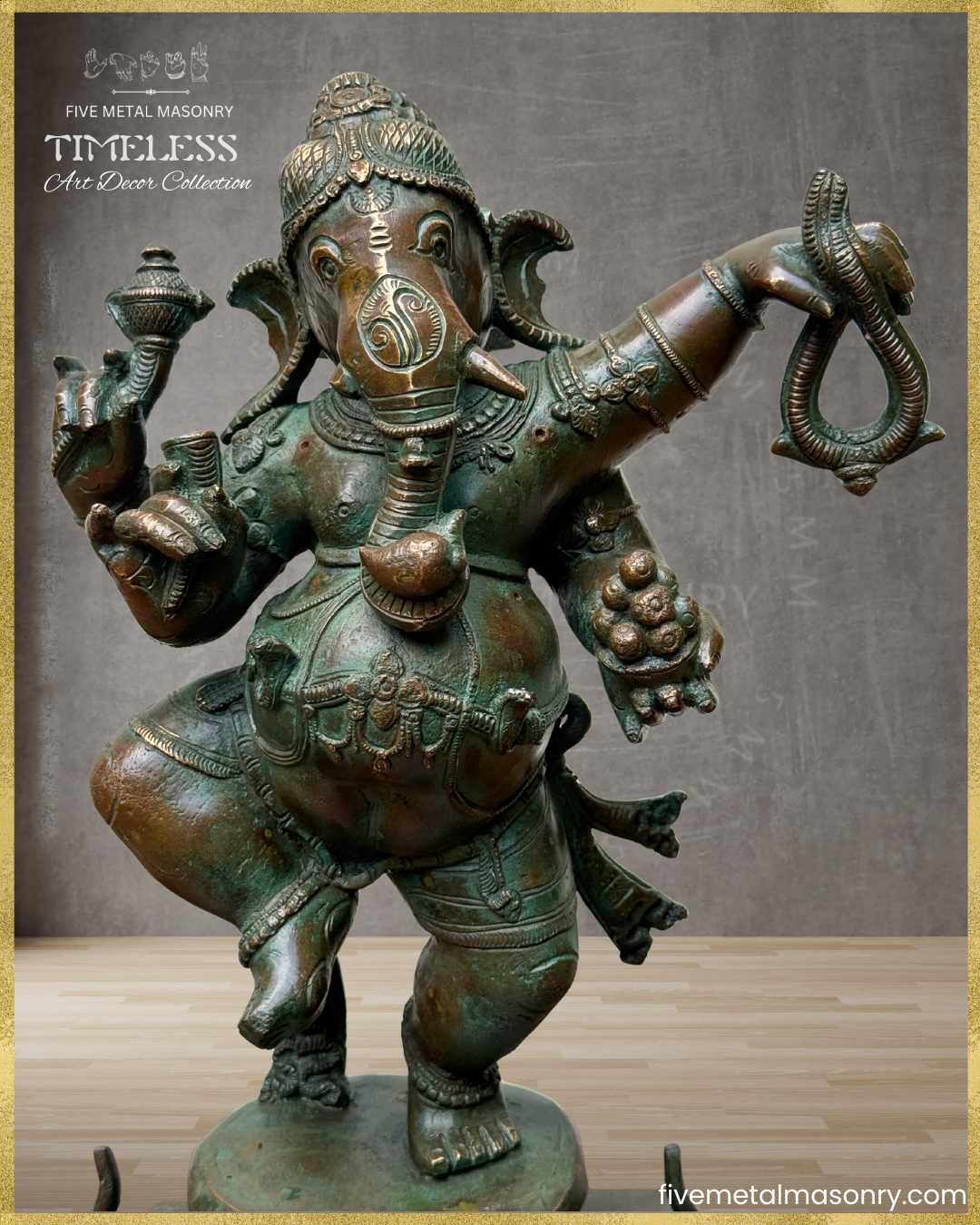 Close-up view of a handcrafted Panchaloha bronze Nṛtta Gaṇeśa from the TIMELESS Collection, depicted in a dynamic dancing posture with four arms holding the aṅkuśa, pāśa, danta and modaka. Adorned with a karaṇḍa-makuṭa, traditional ornaments, and finished in an antique patina.