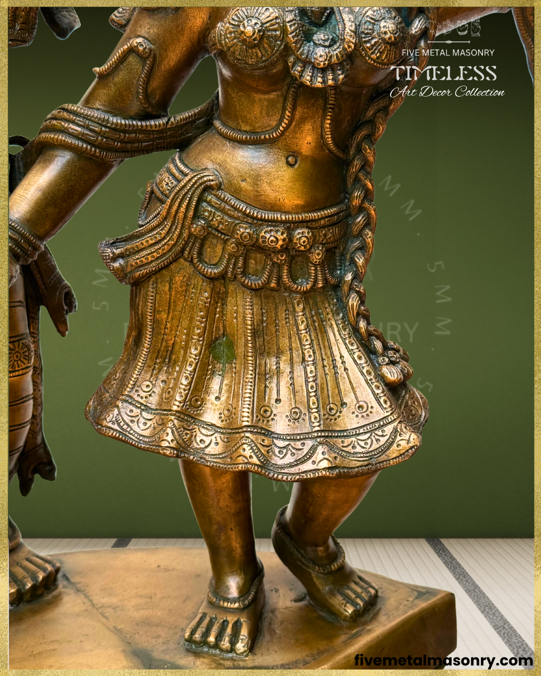 Close-up view of Radha in the handcrafted Panchaloha bronze Radha Krishna sculpture from the Timeless Collection, highlighting the ornamented pleated lower garment, detailed waist belt, flowing side drape, long braided hair, anklets and flexed-leg stance.