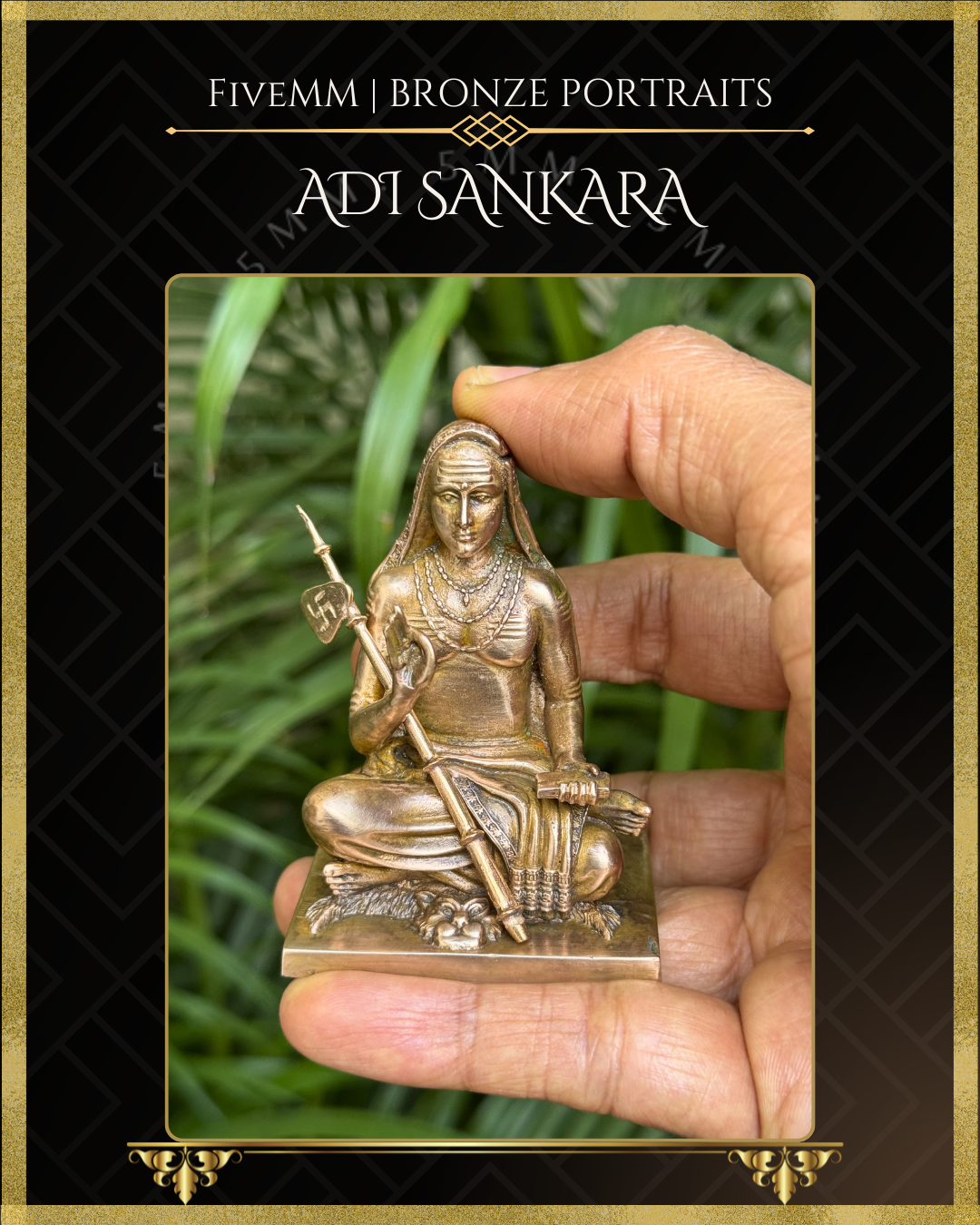 Hand-held view of Handcrafted Panchaloha bronze icon of Adi Shankara seated on a tiger skin, holding a Danda and palm leaf manuscript, with Jnana Mudra . 
