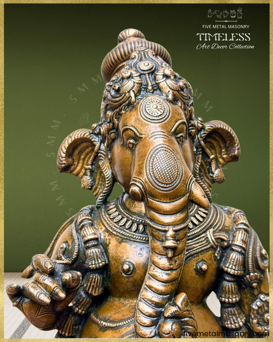 Close-up of antique finish Panchaloha bronze Ganesha, featuring expressive elephant face, karanda makuta, ornate ear ornaments, layered haras and finely detailed South Indian sculptural craftsmanship from the Timeless collection.