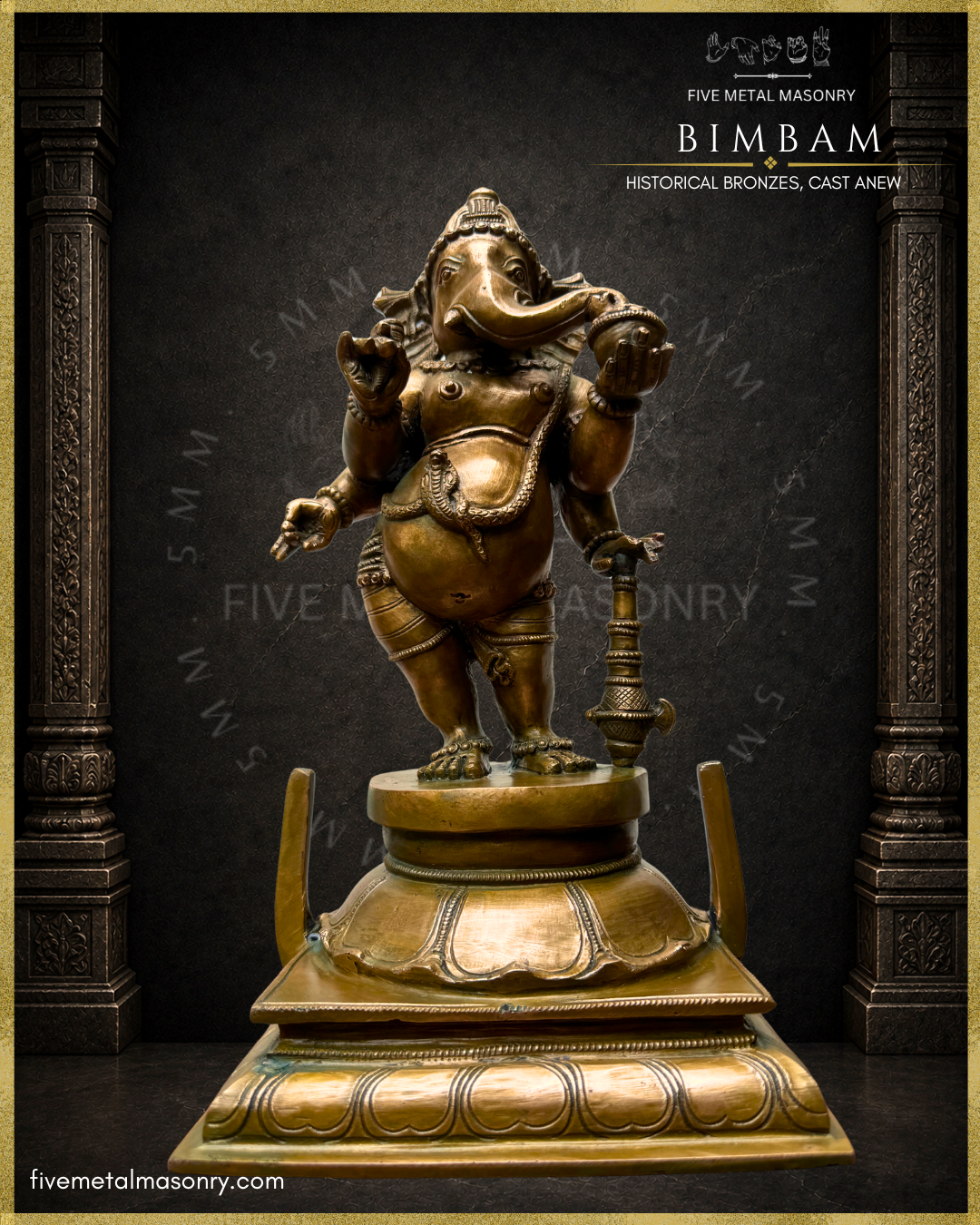 Low angle front view of Handcrafted Panchaloha Thiruvanaikaval Ganesha from the BIMBAM collection, showing the distinctive standing posture, massive belly, serpent upavita, broad fan-like ears, jata-makuta, sideways-curving trunk, broken tusk, cup of sweets and long-handled ankusa.