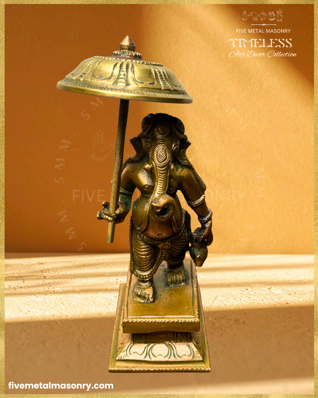 Top angle view of Handcrafted Panchaloha bronze Umbrella Ganesha (Mapillai Ganesha) in a walking posture, holding a ceremonial umbrella and water pot, from the Timeless collection, rooted in silpa-sastra tradition.