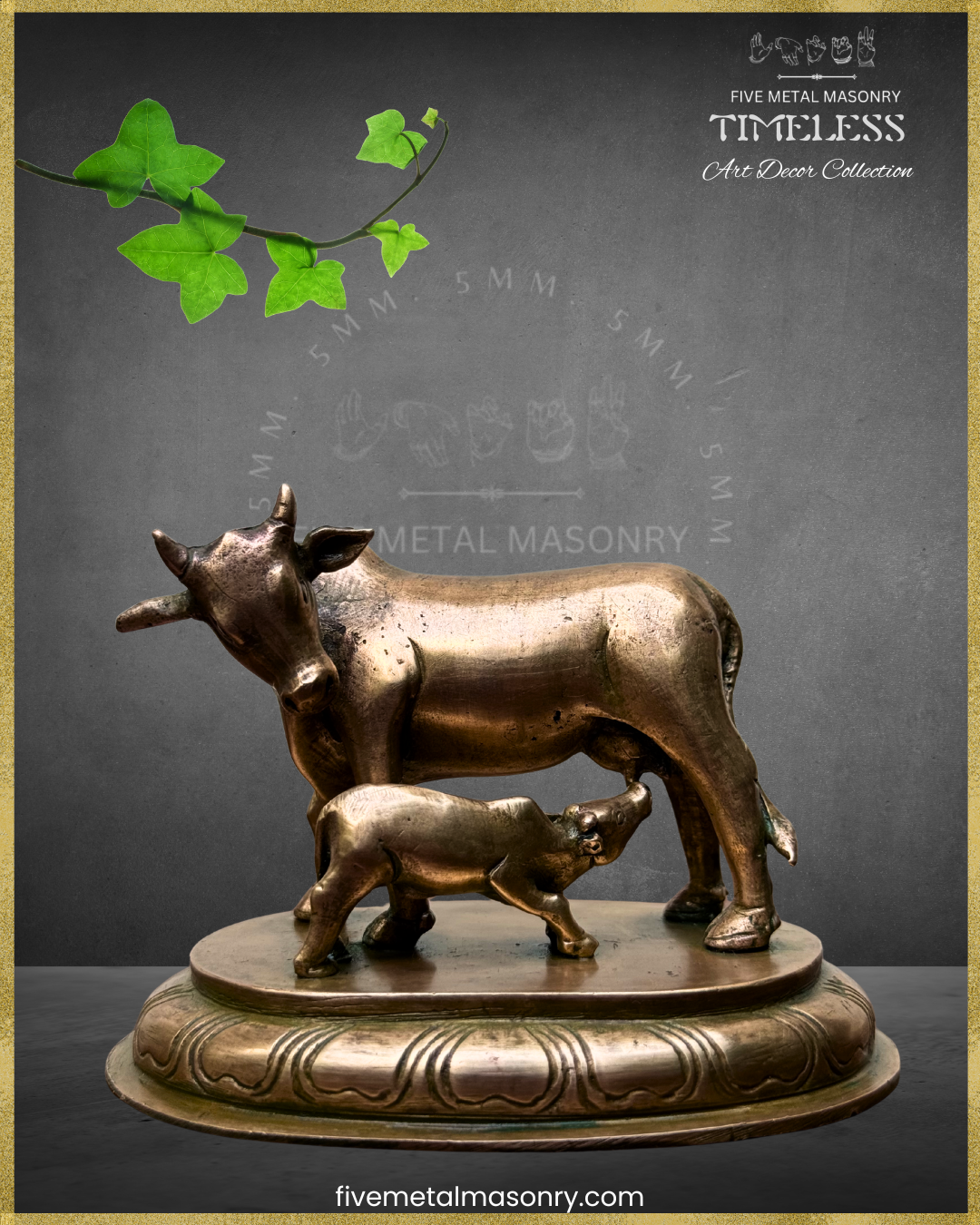Bronze sculpture of a cow and calf on a decorative base with green leaves, against a dark background.