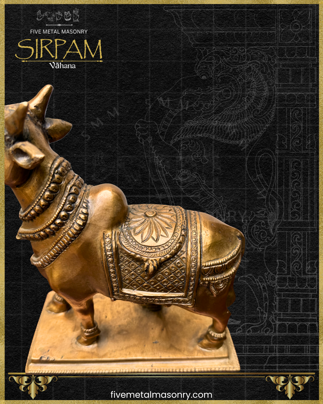 Top angle close-up of a handcrafted panchaloha bronze Vrsabha (Nandi) statue from the Sirpam Collection, highlighting the layered neck ornaments, sculpted hump, ornate ceremonial saddle cloth with floral and geometric motifs, and the graceful modelling of the body in the South Indian sculptural tradition.